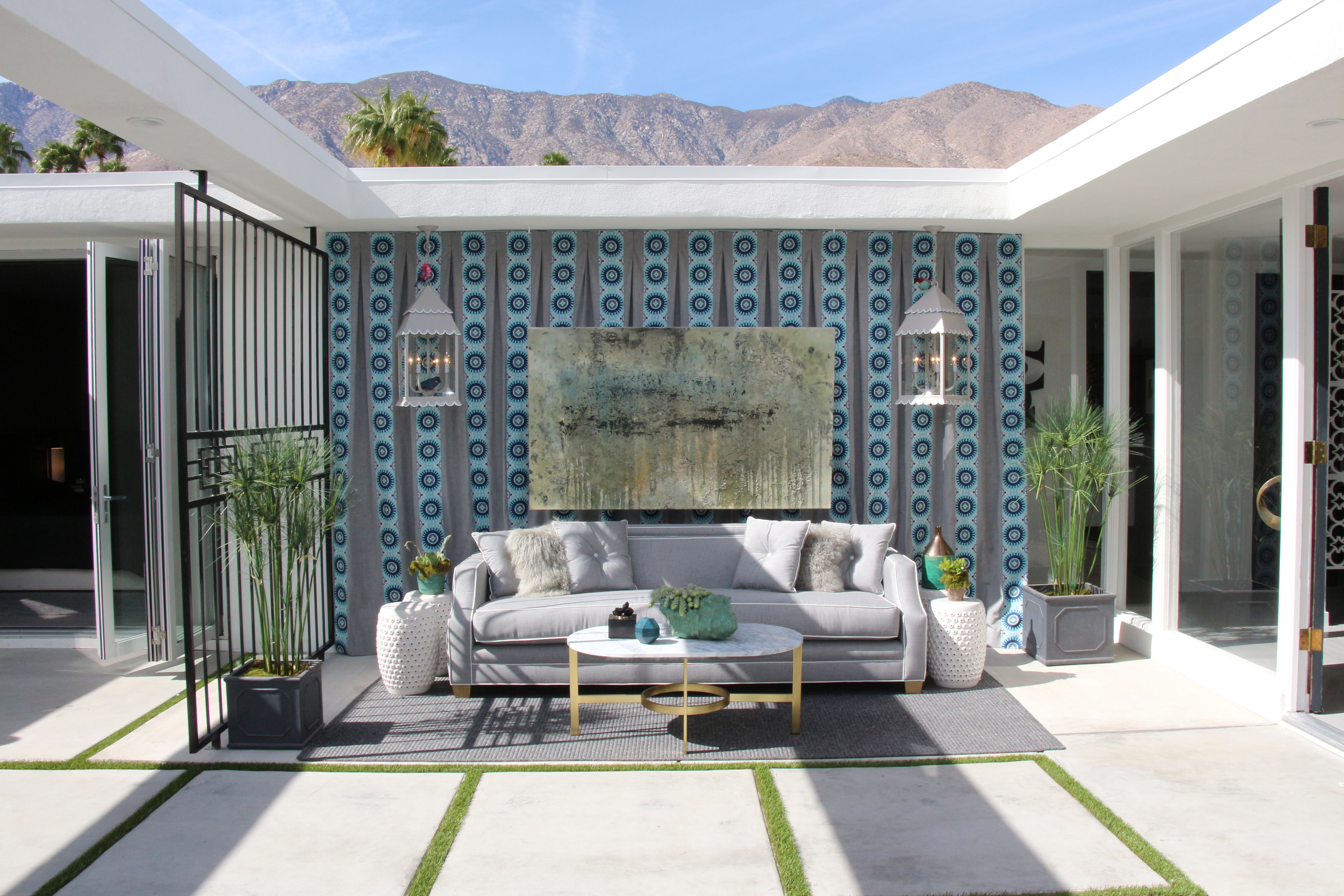 Outdoor midcentury modern lounge for Christopher Kennedy's Modernism Week Showhouse by celebrity designer Lori Dennis