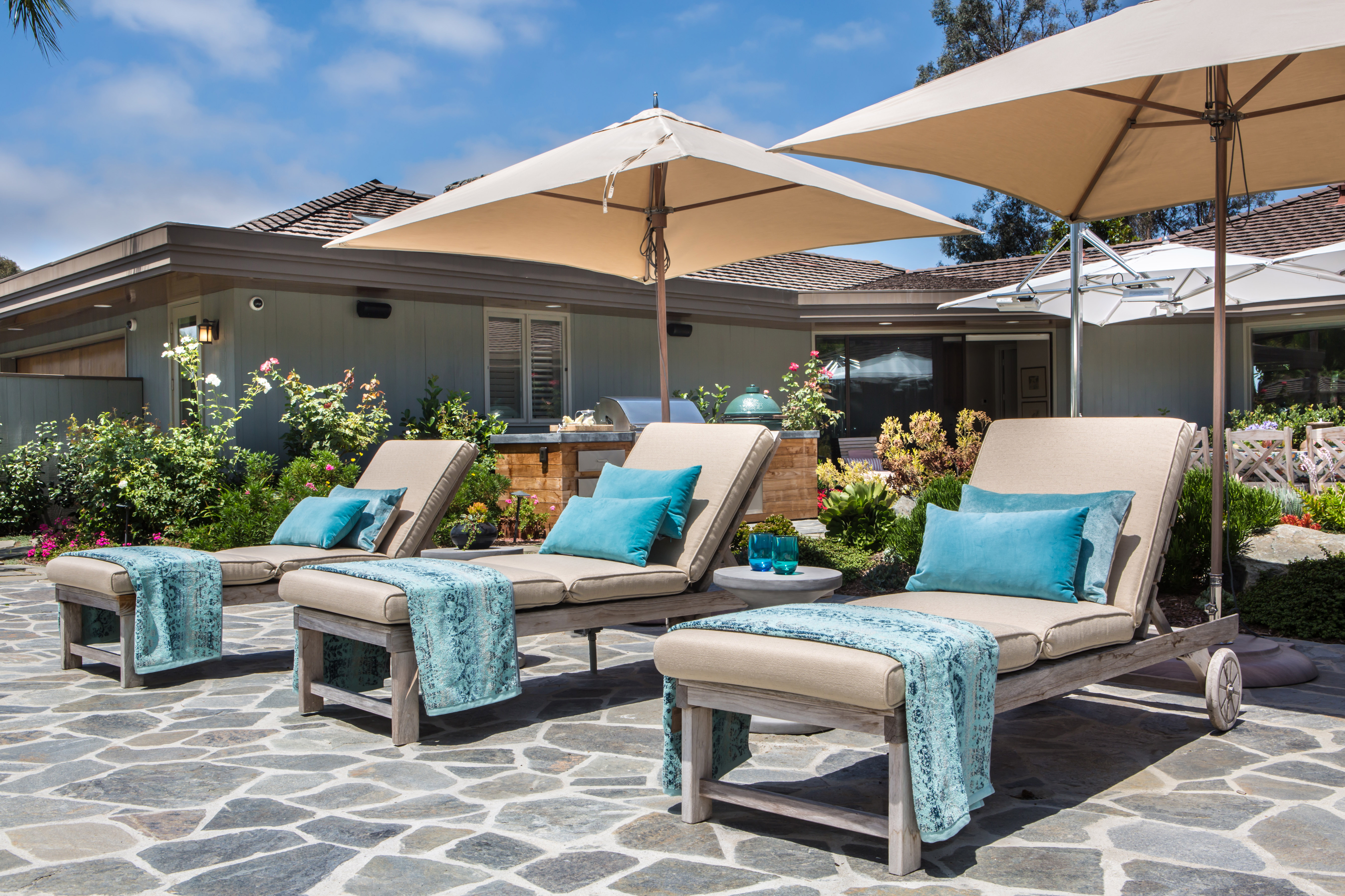 If the swimming pool is the centerpiece of your backyard, a cabana and some traditional chaise lounges are the way to go!