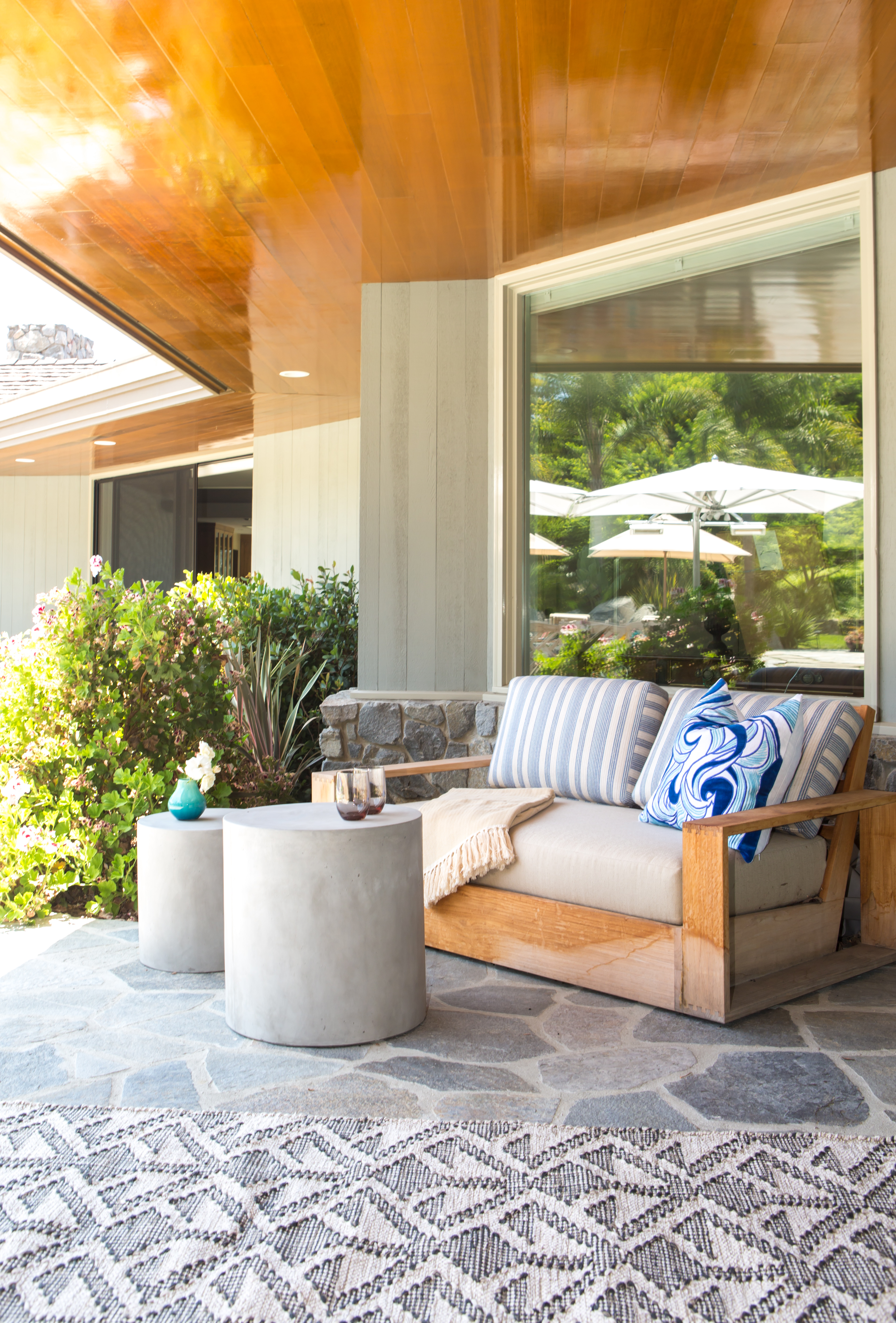 We work on some incredible indoor-outdoor living spaces and in order to seamlessly transition from indoor to out, we utilize durable fabrics and materials that could just as easily be included inside!