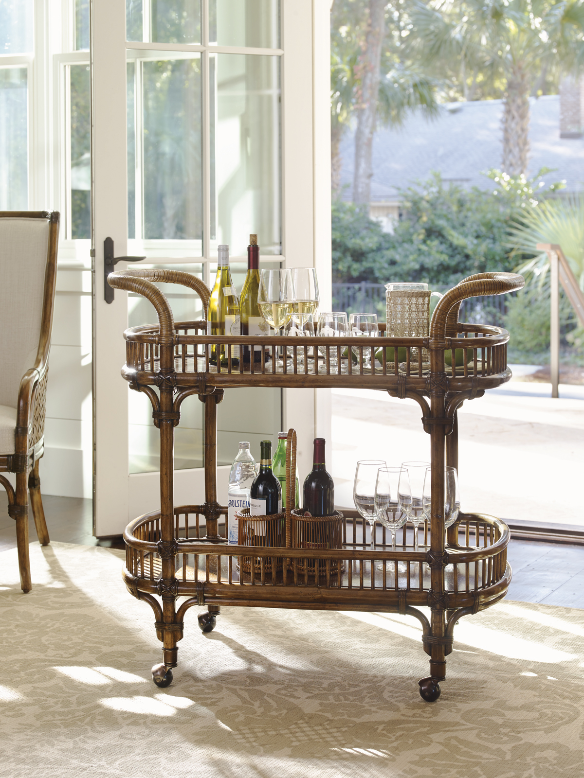 this bar cart from Lexington Home Brands which we can see utilized as much in a formal dining room as we do in a casual game room or parlour.