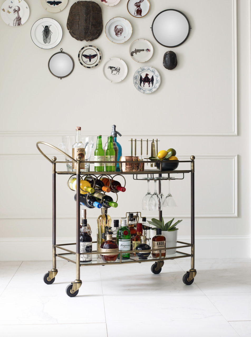 We love this bar cart from Four Hands for its great built-in wine rack.