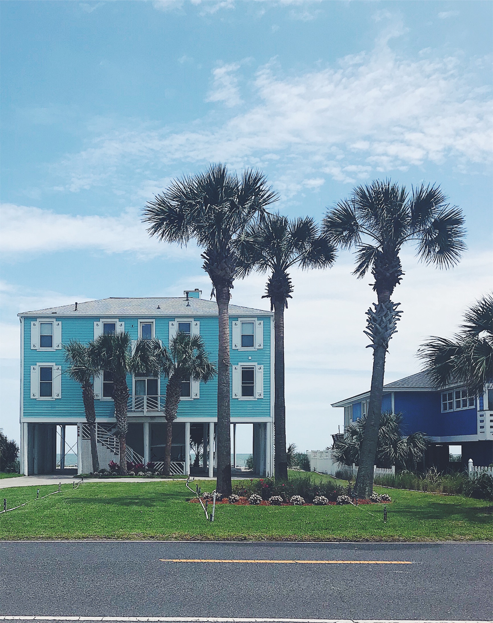 Blue beach house on piers 