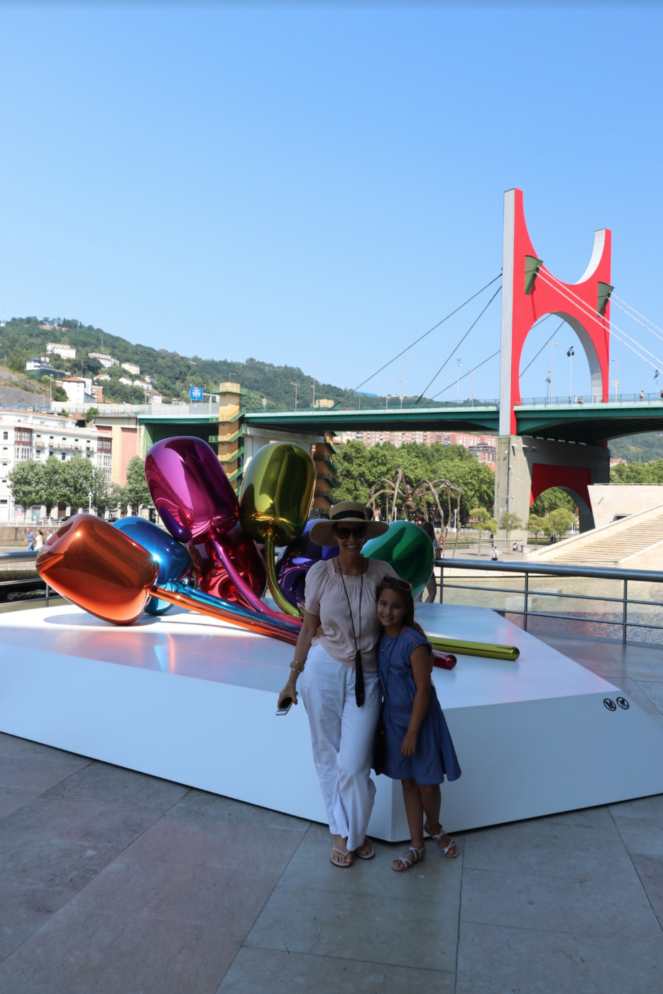Lori Dennis with her daughter outside the Bilbao Guggenheim