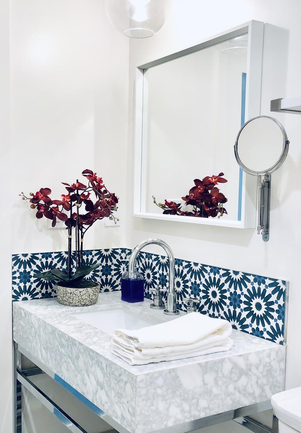 Villa Lagoon tile in small sized powder room in vacation rental trend